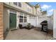 Relaxing outdoor patio with comfortable seating and a grill, perfect for entertaining at 2231 Colfax Ln, Indianapolis, IN 46260