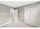 Spacious bedroom showcasing freshly painted walls, flooring, and closet space at 2421 E 11Th St, Indianapolis, IN 46201