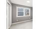 Bedroom with neutral paint, closet and windows with backyard view at 2421 E 11Th St, Indianapolis, IN 46201
