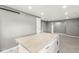 Modern kitchen with a bright island and an open layout to the dining area, with stainless steel handles at 2421 E 11Th St, Indianapolis, IN 46201