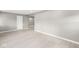 Open living room with light wood-look flooring and freshly painted walls at 2421 E 11Th St, Indianapolis, IN 46201