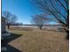 Backyard with a view of a pond and some trees at 3143 Shadow Lake Dr, Indianapolis, IN 46217