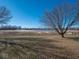 Backyard with a view of a pond and some trees at 3143 Shadow Lake Dr, Indianapolis, IN 46217