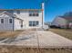 Large concrete patio and deck area, next to a two-story house at 3143 Shadow Lake Dr, Indianapolis, IN 46217