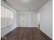 Spacious bedroom with double doors and dark hardwood floors at 3143 Shadow Lake Dr, Indianapolis, IN 46217