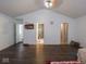 Primary bedroom with hardwood floors, vaulted ceiling and ceiling fan at 3143 Shadow Lake Dr, Indianapolis, IN 46217
