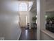 Clean entryway, featuring a staircase and an arched window at 3143 Shadow Lake Dr, Indianapolis, IN 46217