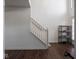 Bright entryway with staircase and dark hardwood floors at 3143 Shadow Lake Dr, Indianapolis, IN 46217