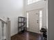 Bright entryway with hardwood floors and a shoe storage system at 3143 Shadow Lake Dr, Indianapolis, IN 46217