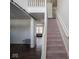 Two-story entryway with staircase and hardwood floors at 3143 Shadow Lake Dr, Indianapolis, IN 46217