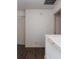 Upstairs hallway with dark hardwood floors and neutral walls at 3143 Shadow Lake Dr, Indianapolis, IN 46217