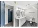 Modern bathroom with double vanity, hexagon tile floor and updated fixtures at 350 E Minnesota St, Indianapolis, IN 46225