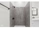 Bathroom with gray tile shower and modern vanity at 350 E Minnesota St, Indianapolis, IN 46225