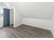 Charming bedroom with wood-look flooring and a built-in closet at 350 E Minnesota St, Indianapolis, IN 46225