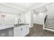 Modern kitchen with granite countertops and white cabinets at 350 E Minnesota St, Indianapolis, IN 46225