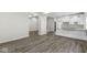 Open concept kitchen and dining area with granite countertops and modern cabinetry at 350 E Minnesota St, Indianapolis, IN 46225