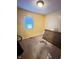Bedroom featuring carpeted floors, neutral colored walls, and a bright window at 4114 N Butler Ave, Indianapolis, IN 46226