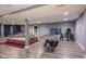 Spacious basement with a pool table and a comfortable sectional sofa at 5782 Jamestown Square Ln, Indianapolis, IN 46234