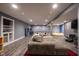 Spacious basement with a pool table and a comfortable sectional sofa at 5782 Jamestown Square Ln, Indianapolis, IN 46234