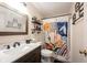 Bathroom featuring a floating shelves and a colorful shower curtain at 5782 Jamestown Square Ln, Indianapolis, IN 46234