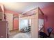 Bedroom featuring a loft bed with a desk and shelves underneath at 5782 Jamestown Square Ln, Indianapolis, IN 46234