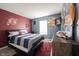 Bedroom featuring sports themed decor and blue and red wall color at 5782 Jamestown Square Ln, Indianapolis, IN 46234