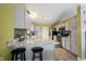 Modern kitchen features granite countertops and stainless steel appliances at 5782 Jamestown Square Ln, Indianapolis, IN 46234