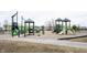 Community playground featuring slides, climbing structures, and swings for outdoor fun at 5782 Jamestown Square Ln, Indianapolis, IN 46234