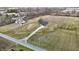 Wide shot of the home's landscaping, surrounding acreage, and driveway at 5802 Watson Rd, Greenwood, IN 46143