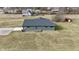 Aerial shot of the home's rear yard and landscaping at 5802 Watson Rd, Greenwood, IN 46143