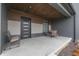 Charming front porch with a cozy seating area, stylish front door, and modern architectural accents at 5802 Watson Rd, Greenwood, IN 46143