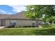 Brick home with verdant landscaping, enhancing its curb appeal and blending seamlessly with the neighborhood at 5850 Bradston Way, Indianapolis, IN 46237