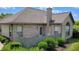 Beautiful brick home featuring a private fenced-in patio and lush greenery, perfect for outdoor relaxation at 5850 Bradston Way, Indianapolis, IN 46237