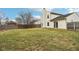 Spacious backyard with a wooden fence at 6354 River Run Dr, Indianapolis, IN 46221