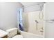 Bathroom with tub shower, and ocean-themed curtain at 6354 River Run Dr, Indianapolis, IN 46221