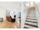 View of the staircase leading to the upper level of the home at 6354 River Run Dr, Indianapolis, IN 46221