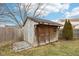 Wooden storage shed in backyard at 6354 River Run Dr, Indianapolis, IN 46221