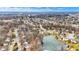 Aerial view of a neighborhood with houses and trees at 6530 Duck Pond Dr, Fishers, IN 46038