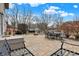 Outdoor space with a charming fire pit area and ample seating, perfect for gatherings at 6530 Duck Pond Dr, Fishers, IN 46038