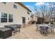 Beautiful backyard with a spacious stone patio, ideal for outdoor entertaining at 6530 Duck Pond Dr, Fishers, IN 46038