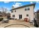 Home exterior with a stone patio and well-maintained backyard, great for outdoor living at 6530 Duck Pond Dr, Fishers, IN 46038