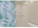 Clean bathroom with a shower and tropical shower curtain at 714 Buchanan St # 5, Indianapolis, IN 46203