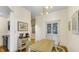 Dining area with a wooden table and white hutch at 714 Buchanan St # 5, Indianapolis, IN 46203