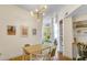 Dining area with a wooden table and chairs, near the kitchen at 714 Buchanan St # 5, Indianapolis, IN 46203