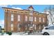 Brick building with ornate detailing and multiple windows at 714 Buchanan St # 5, Indianapolis, IN 46203