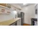Small kitchen with white cabinets and modern appliances at 714 Buchanan St # 5, Indianapolis, IN 46203