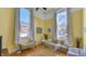 Bright living room with hardwood floors and large windows at 714 Buchanan St # 5, Indianapolis, IN 46203