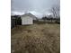 Large backyard with shed and raised garden beds at 7307 Thornmill Ct, Avon, IN 46123