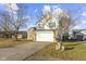 Two-story house with attached garage and manicured lawn at 7307 Thornmill Ct, Avon, IN 46123