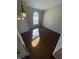 View of the living room that features hard floors and a window for natural light at 7307 Thornmill Ct, Avon, IN 46123